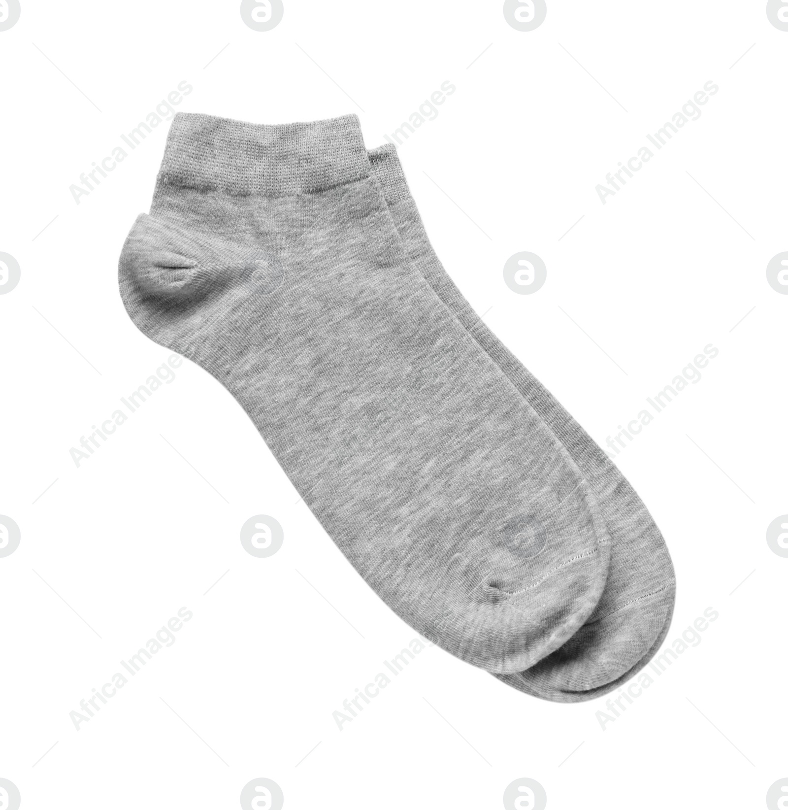 Photo of Pair of grey socks on white background, top view