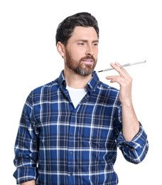 Photo of Man using long cigarette holder for smoking isolated on white