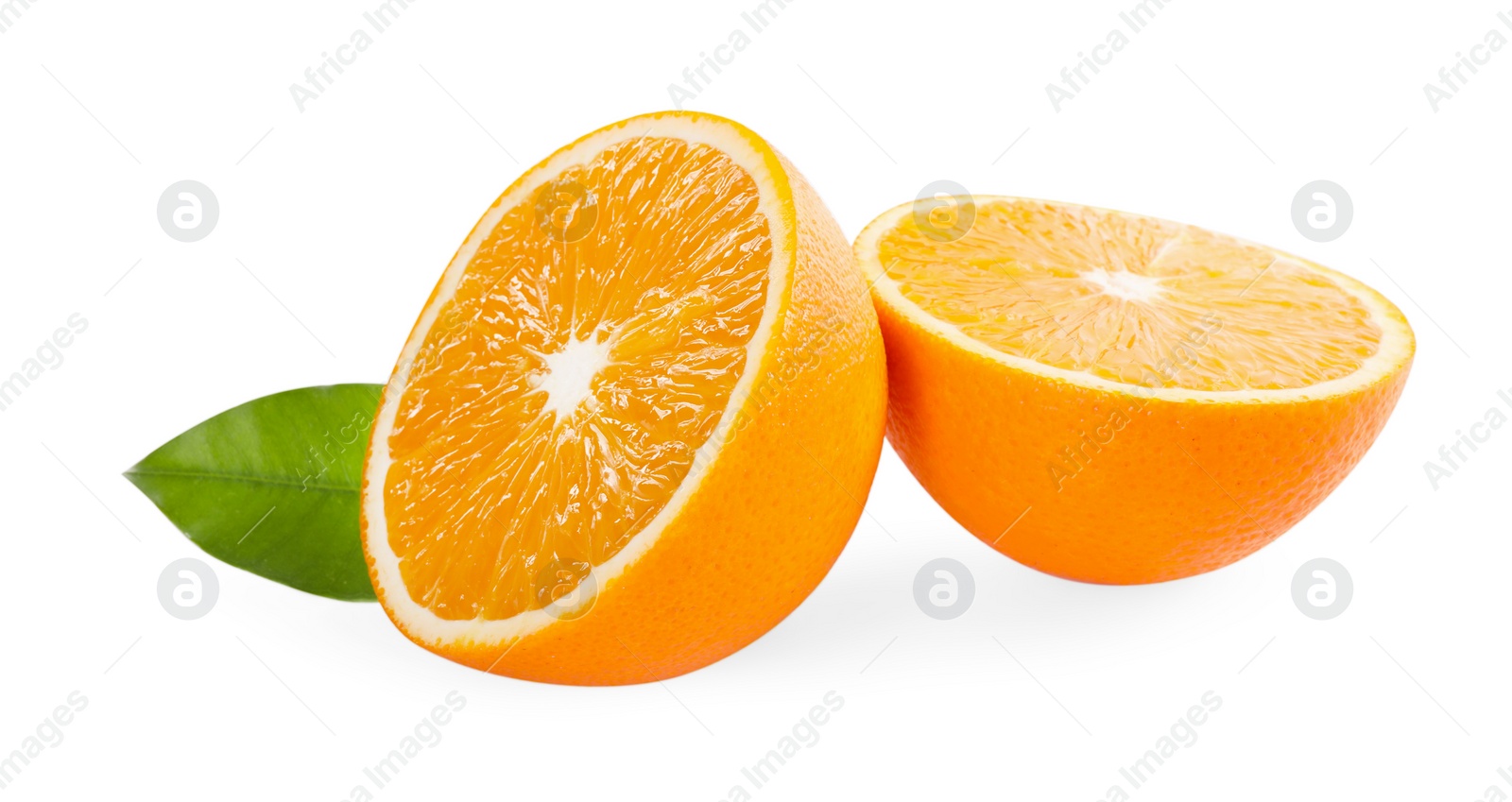 Photo of Halves of fresh ripe orange and green leaf isolated on white