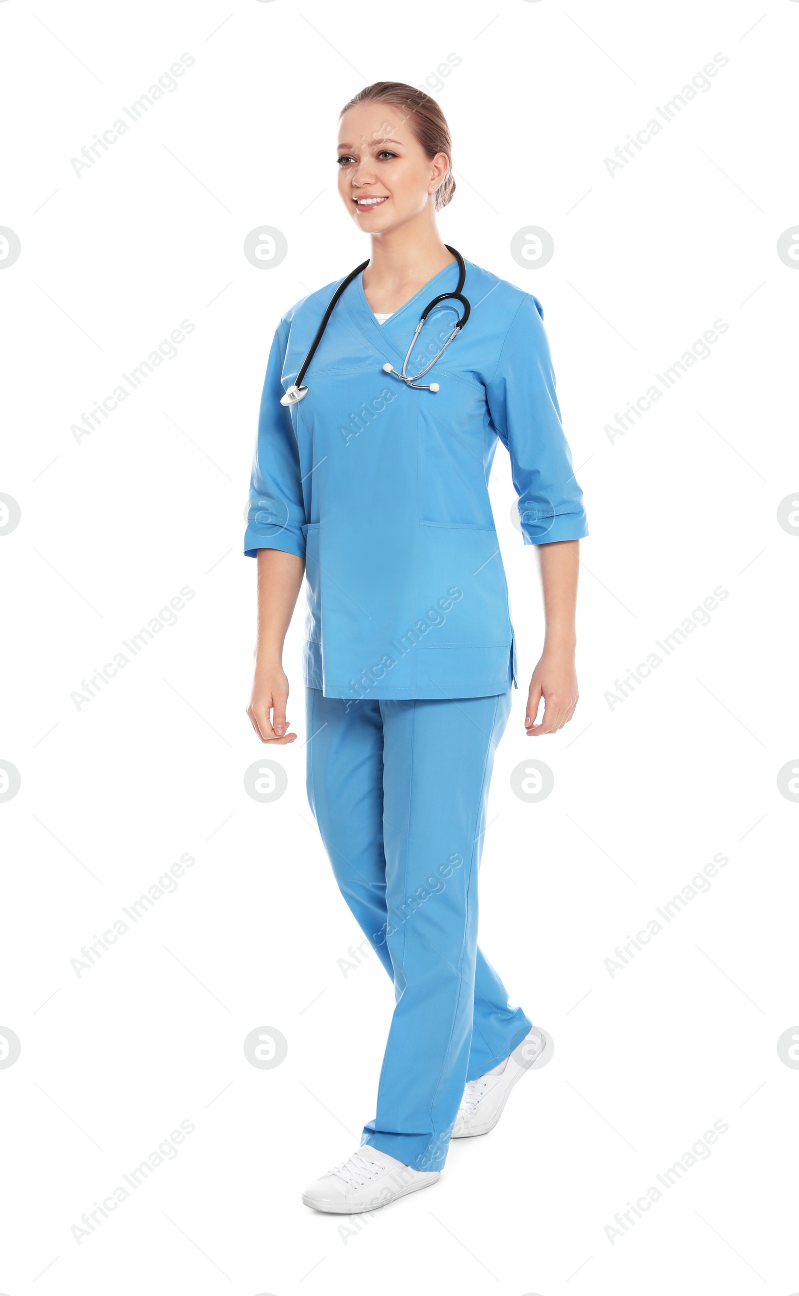 Photo of Full length portrait of medical doctor with stethoscope isolated on white