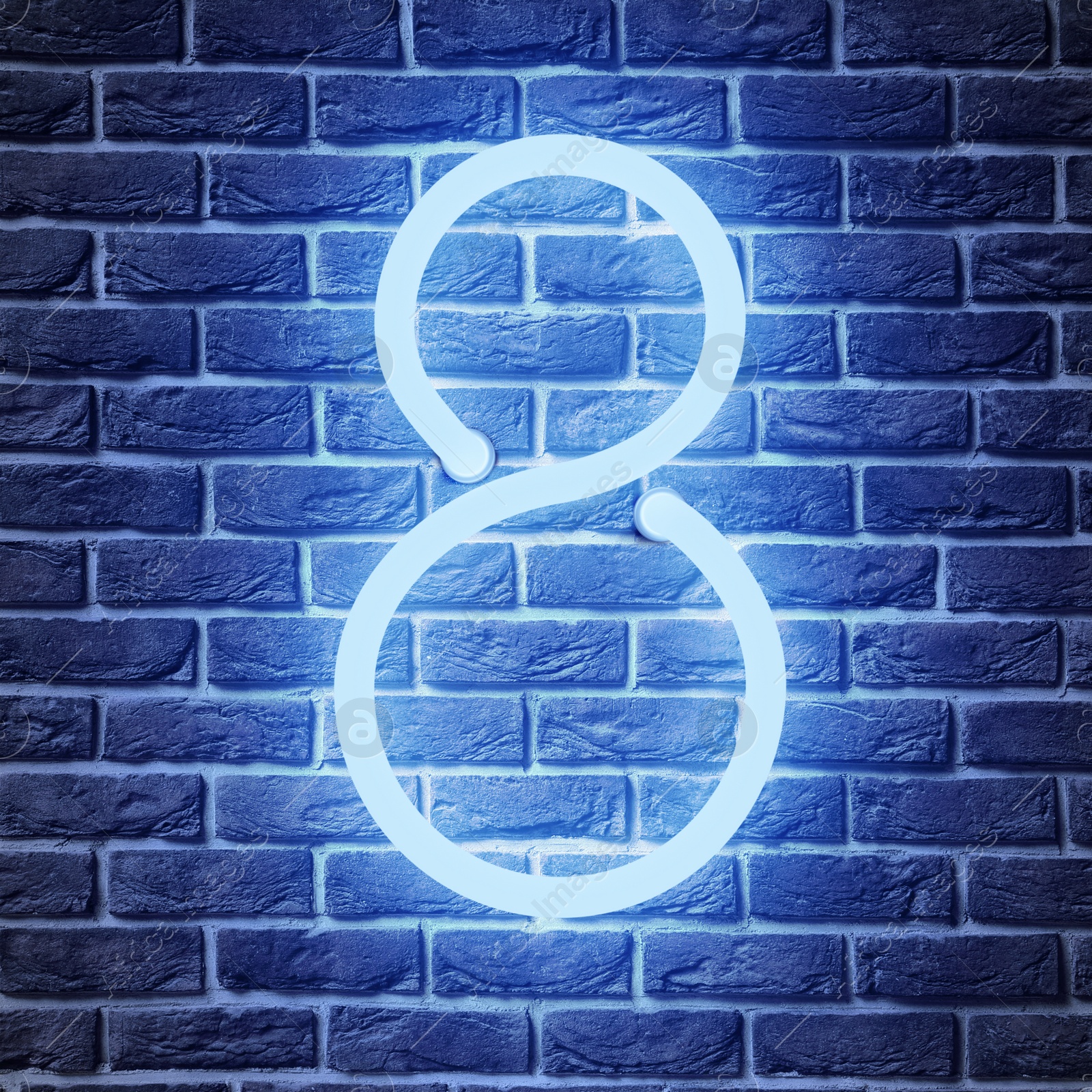 Image of Glowing neon number 8 sign on brick wall