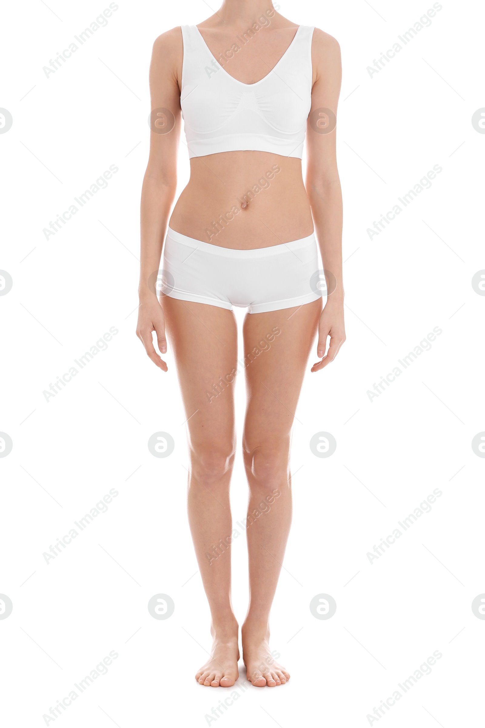 Photo of Young slim woman on white background, closeup. Weight loss