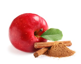 Aromatic cinnamon sticks, powder and red apple isolated on white