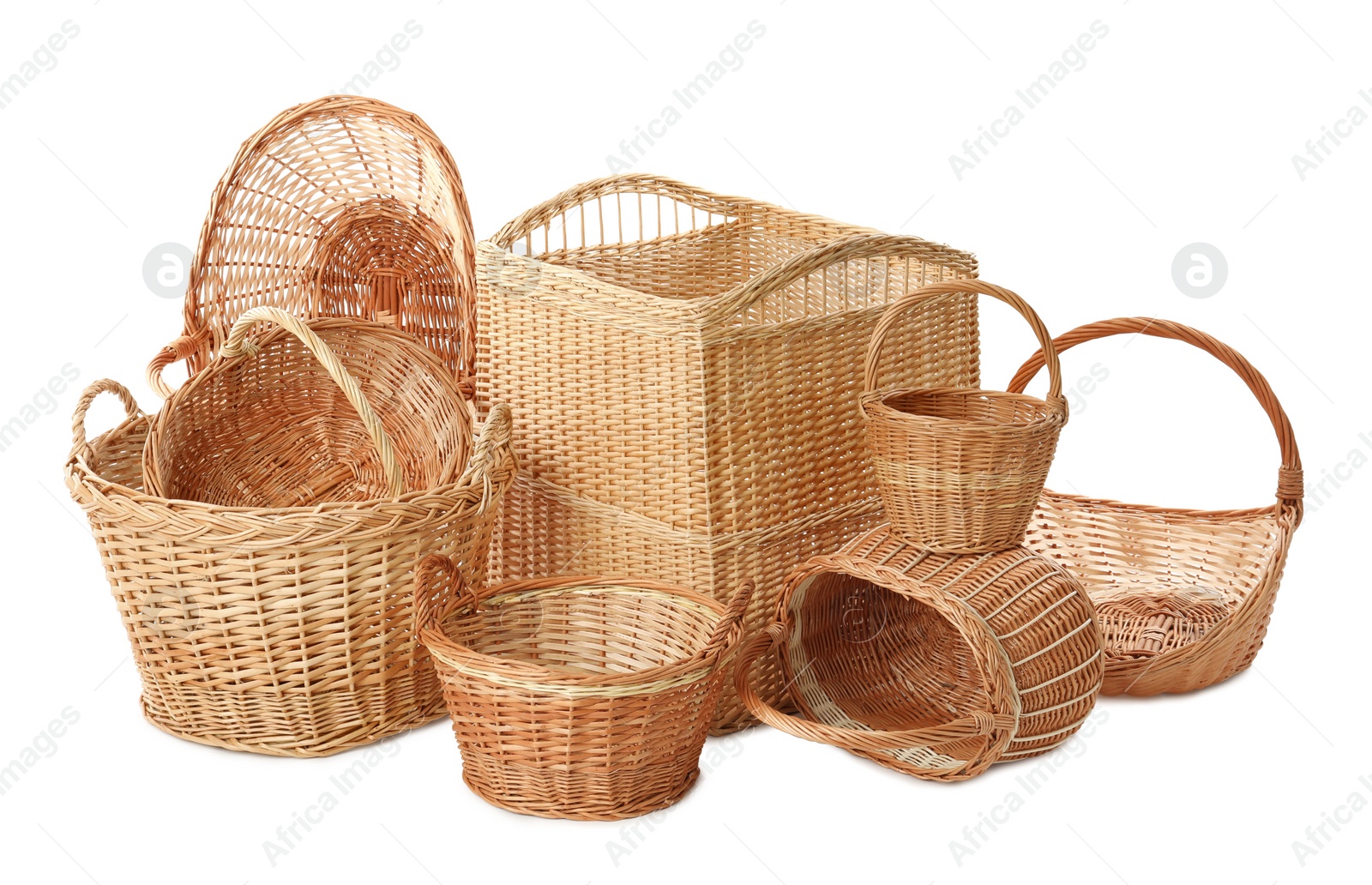 Photo of Many different wicker baskets on white background