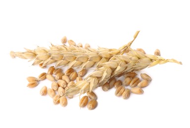 Photo of Pile of wheat grains and spikes on white background