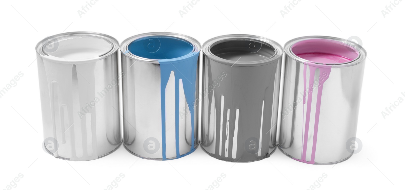 Photo of Cans of colorful paints isolated on white