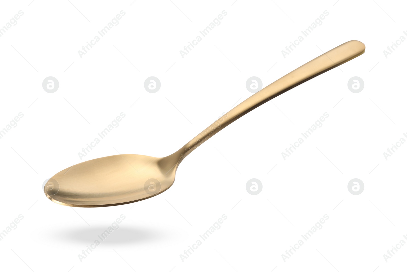 Image of Golden spoon in air isolated on white