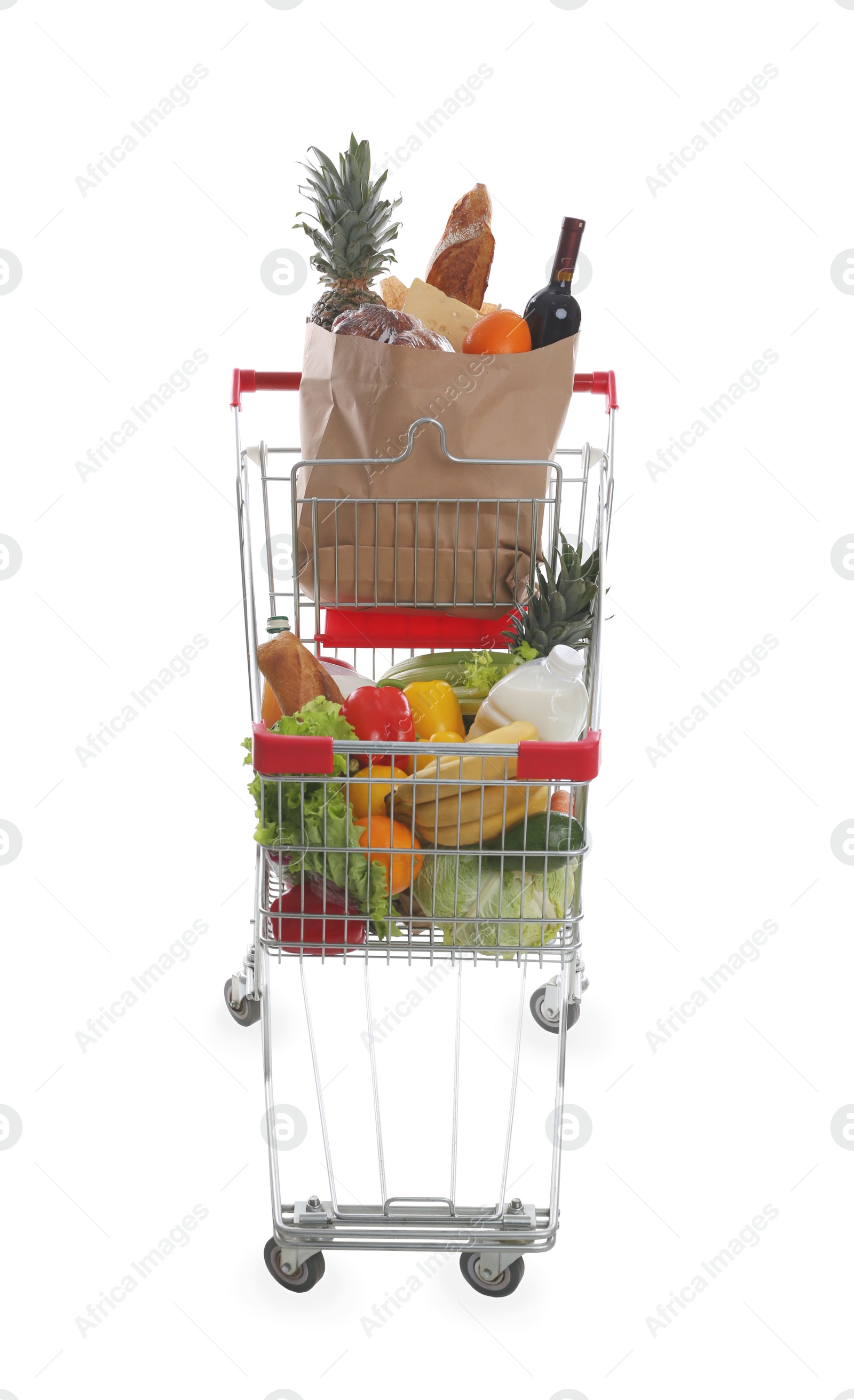 Photo of Shopping cart with groceries on white background