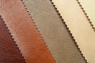 Texture of different natural leather as background, top view
