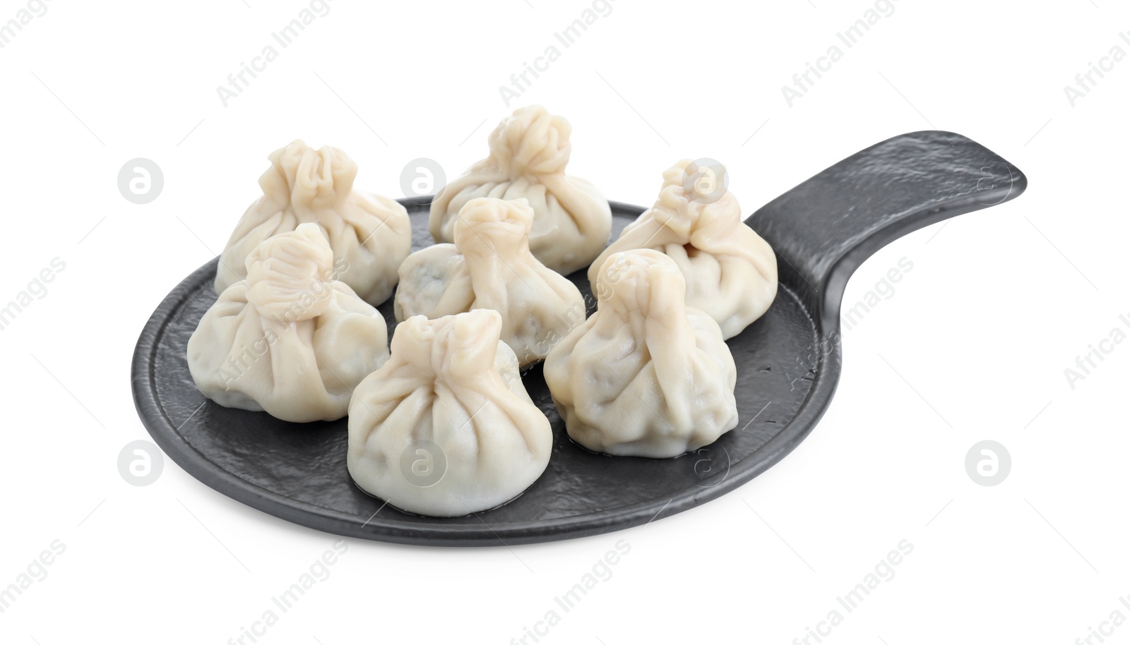 Photo of Serving board with tasty fresh khinkali (dumplings) isolated on white. Georgian cuisine