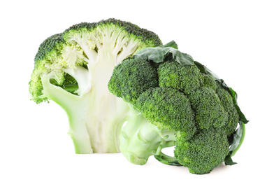 Image of Fresh cut and whole broccoli on white background