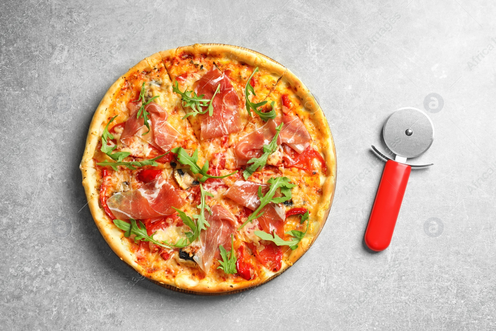 Photo of Delicious pizza with meat on light background, top view