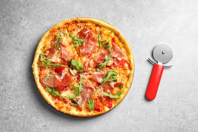 Photo of Delicious pizza with meat on light background, top view