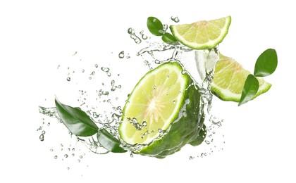 Image of Fresh ripe bergamot fruits, green leaves and splashing water on white background