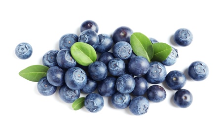 Photo of Fresh raw tasty blueberries with leaves isolated on white, top view
