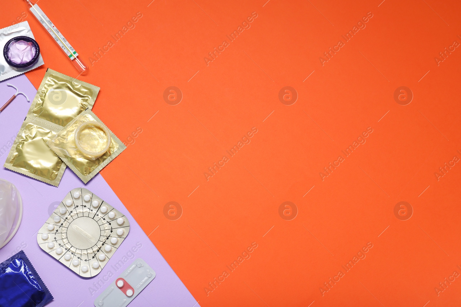 Photo of Contraceptive pills, condoms, intrauterine device and thermometer on color background, flat lay and space for text. Different birth control methods