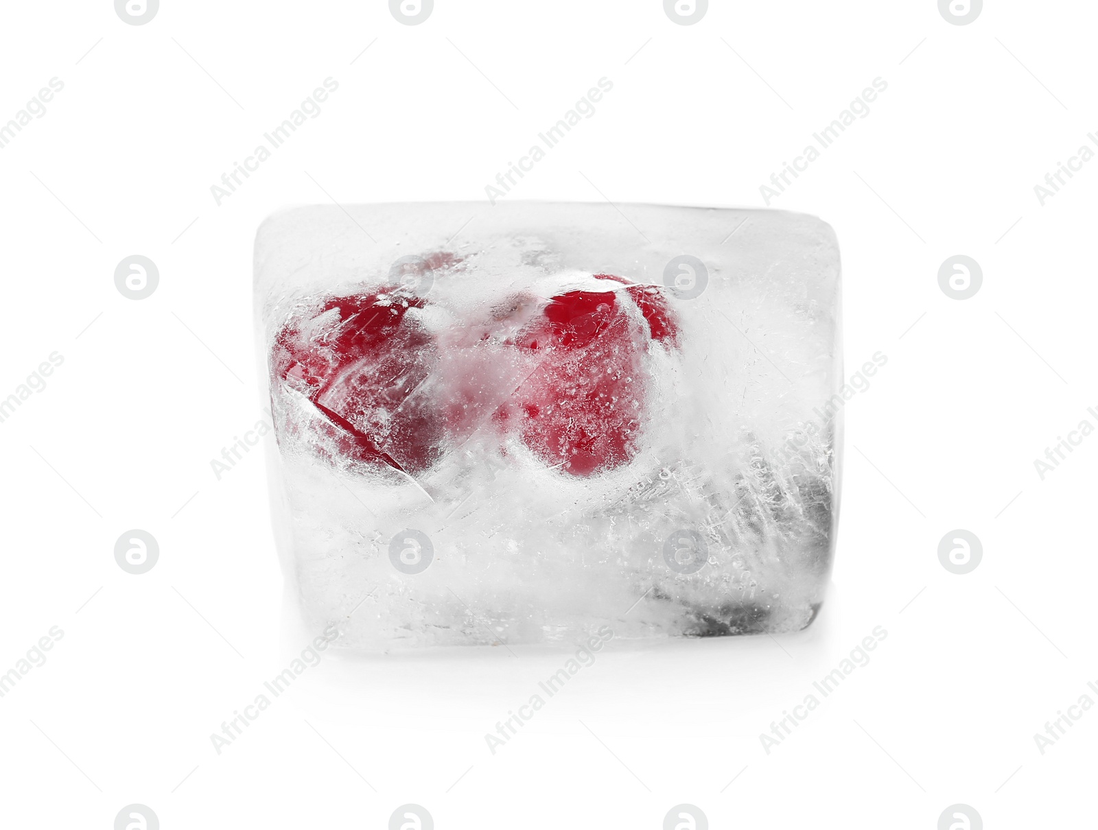 Photo of Raw berries frozen in ice cube on white background