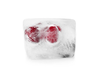 Photo of Raw berries frozen in ice cube on white background