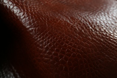 Photo of Beautiful red leather as background, closeup view