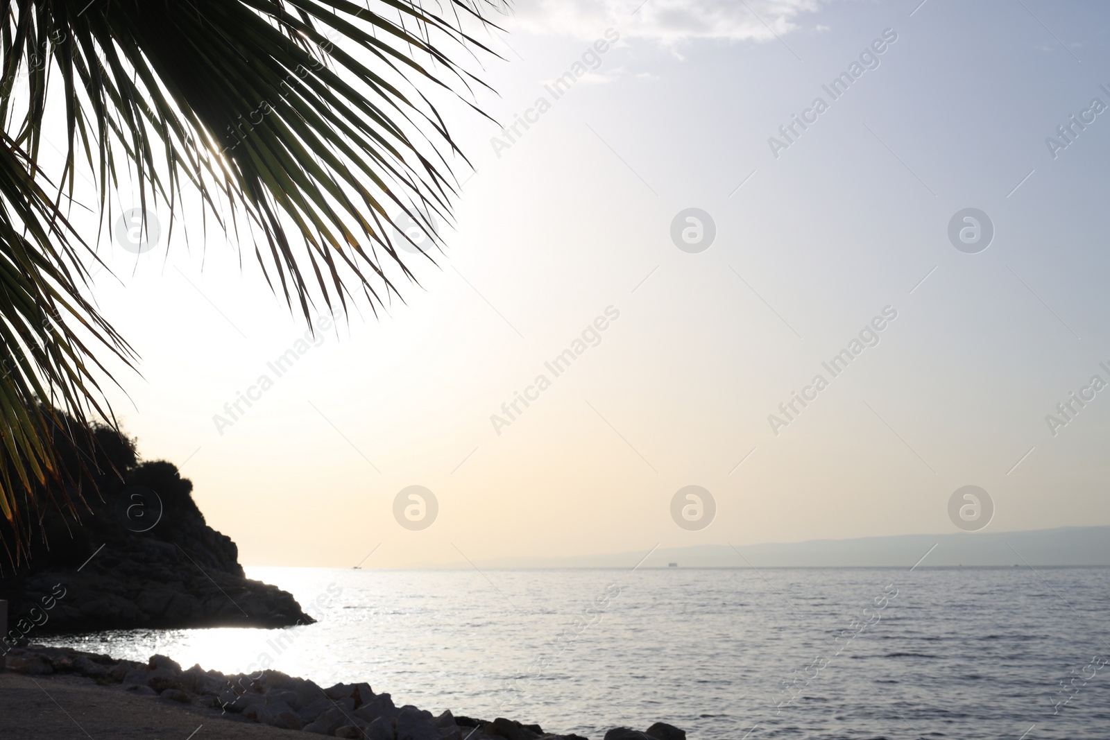 Photo of Beautiful view of seascape and blue sky at sunset