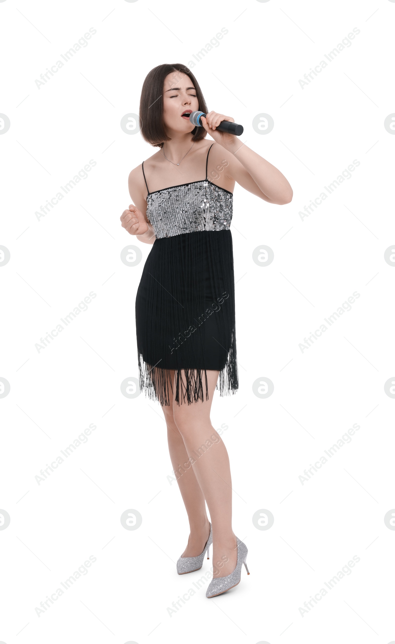 Photo of Beautiful young woman with microphone singing on white background