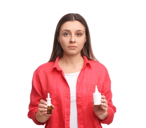 Photo of Woman with nasal sprays on white background