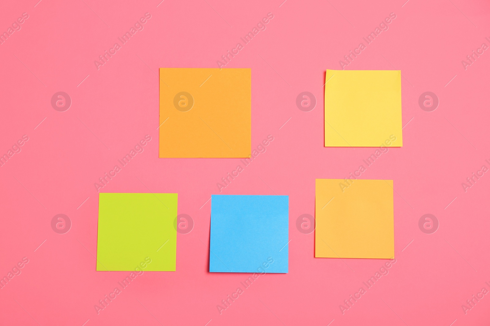 Photo of Many colorful stickers on pink background, flat lay