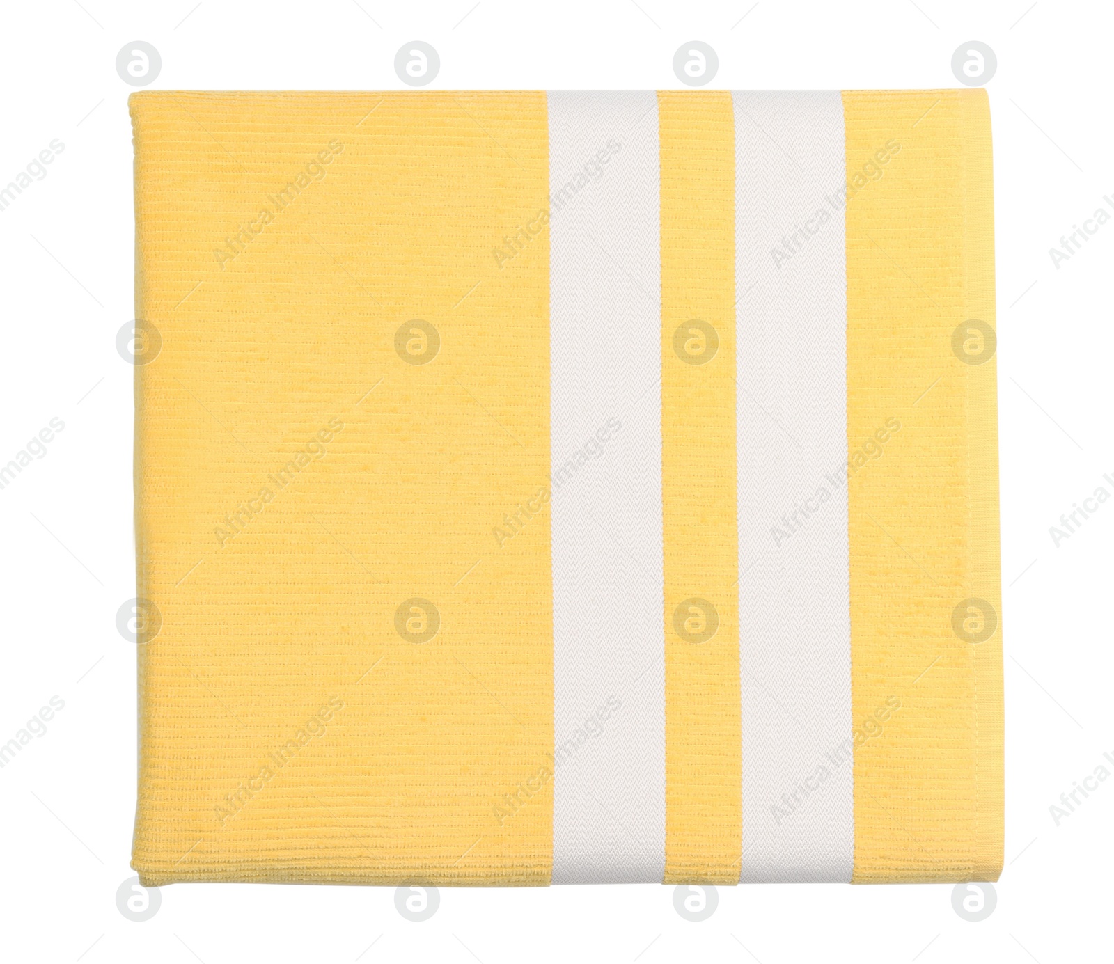 Photo of Folded yellow beach towel on white background, top view