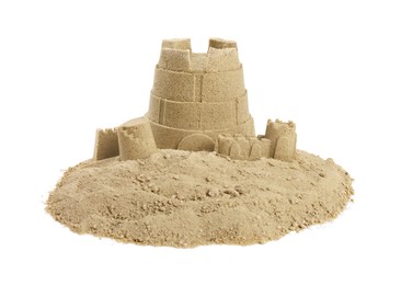 Photo of Pile of sand with beautiful castle isolated on white