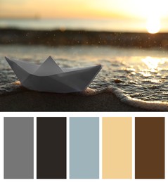 Image of Color palette appropriate to photo of white paper boat on beach near sea at sunset