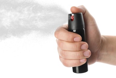 Image of Man using pepper spray on white background, closeup