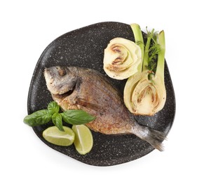 Photo of Delicious roasted dorado fish with fennel, lime and basil isolated on white, top view
