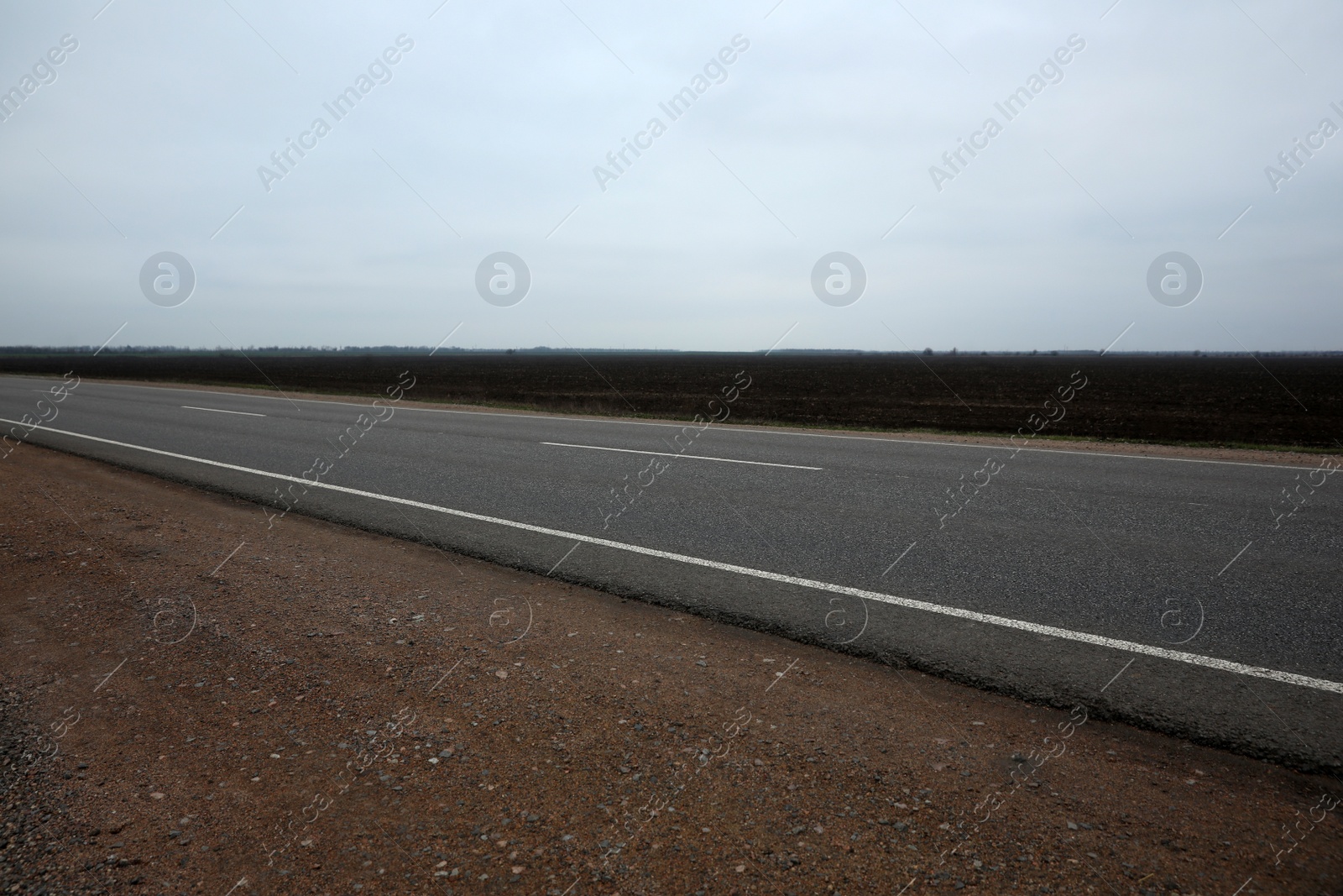 Photo of Beautiful view of asphalt highway without transport