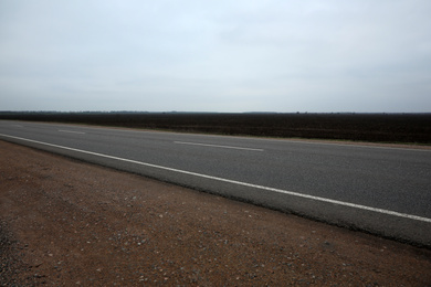 Beautiful view of asphalt highway without transport