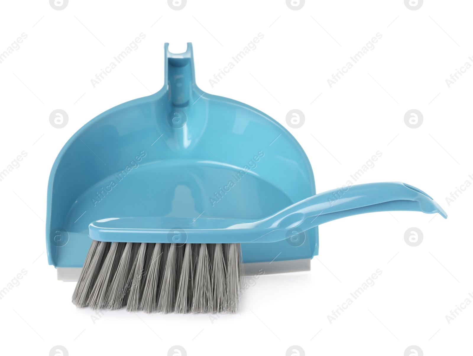 Photo of Plastic hand broom and dustpan on white background