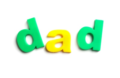 Photo of Word DAD of magnetic letters on white background, top view