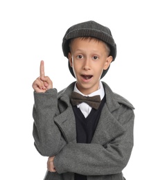 Photo of Cute little detective in hat and coat on white background