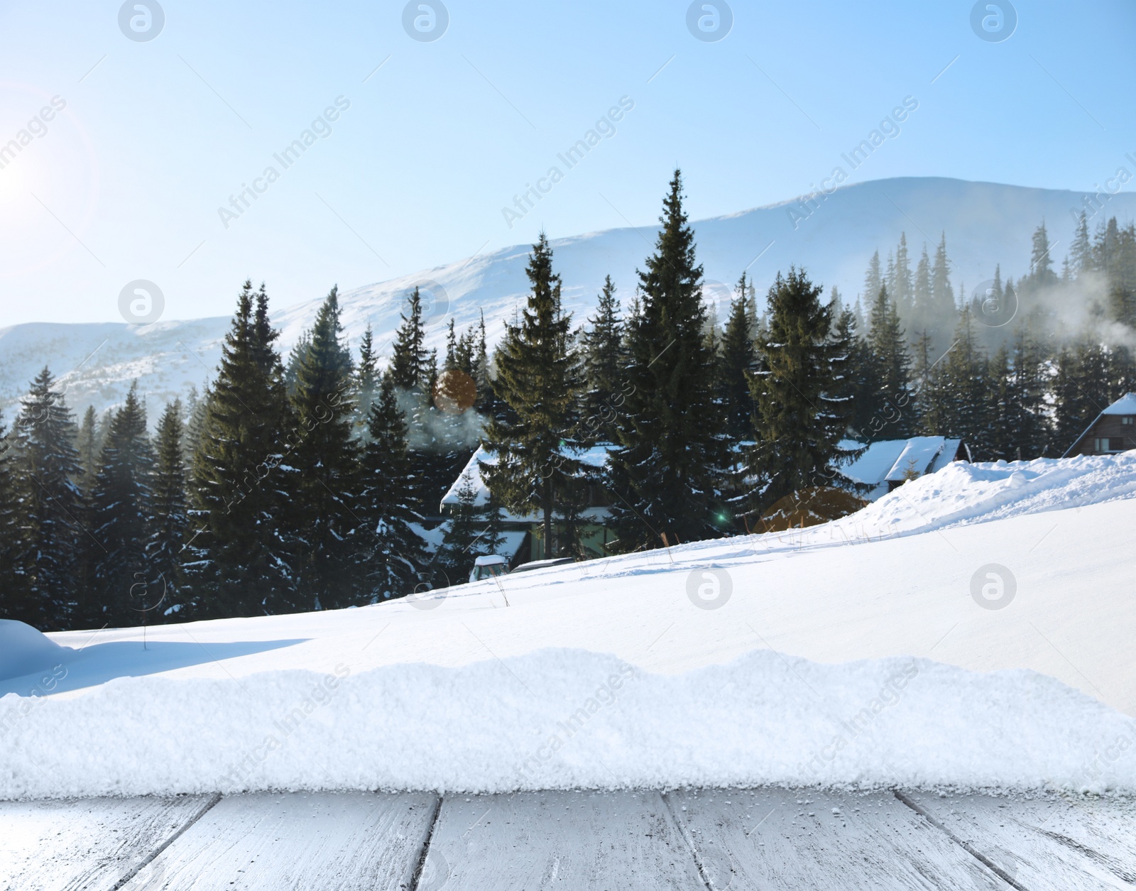 Image of Wooden surface and beautiful view of winter landscape 