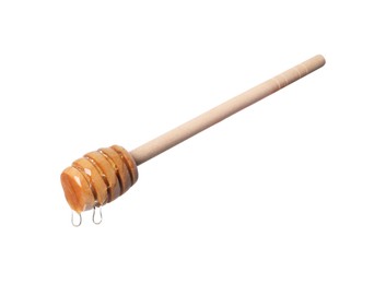 Photo of Natural honey dripping from dipper on white background