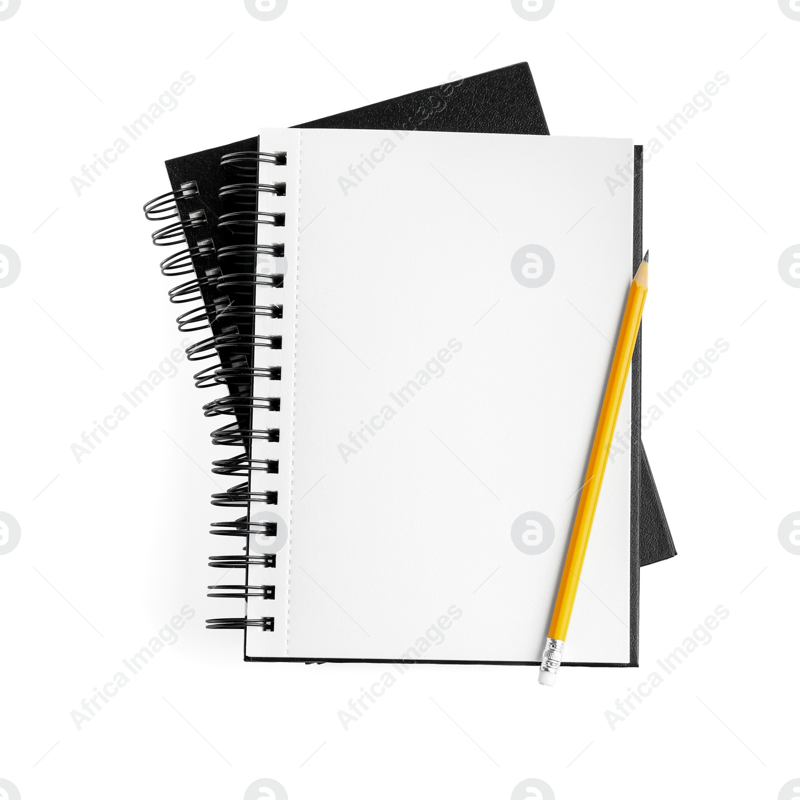 Photo of Notebook and pencil isolated on white, top view