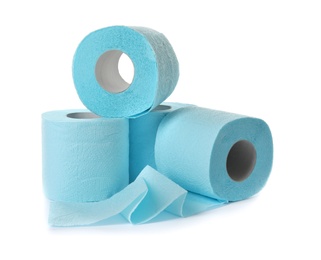 Photo of Color toilet paper rolls on white background