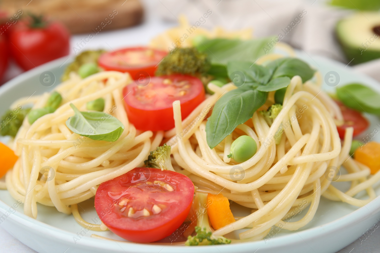 Photo of Plate of delicious pasta primavera, closeup view