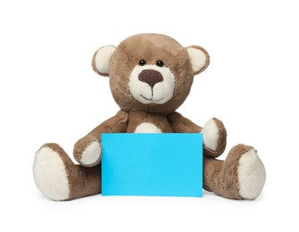 Photo of Cute teddy bear with blank card isolated on white, space for text