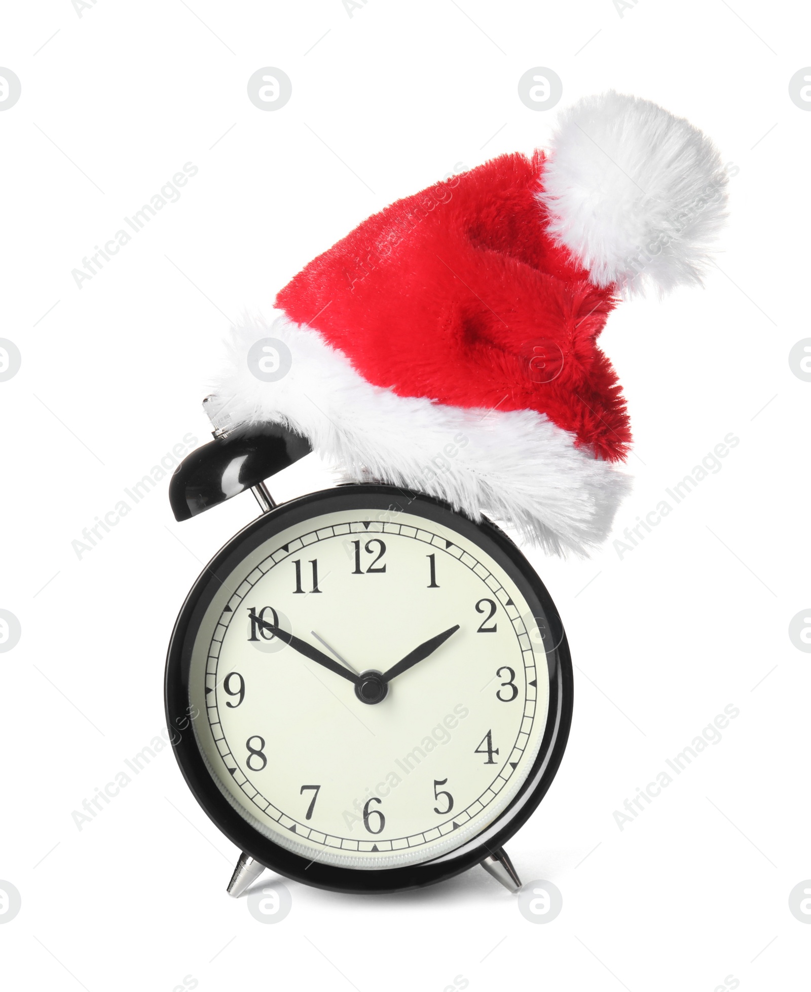 Photo of Alarm clock with Santa hat on white background. Christmas countdown