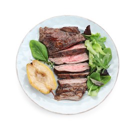Photo of Pieces of delicious roasted beef meat, caramelized pear and greens isolated on white, top view