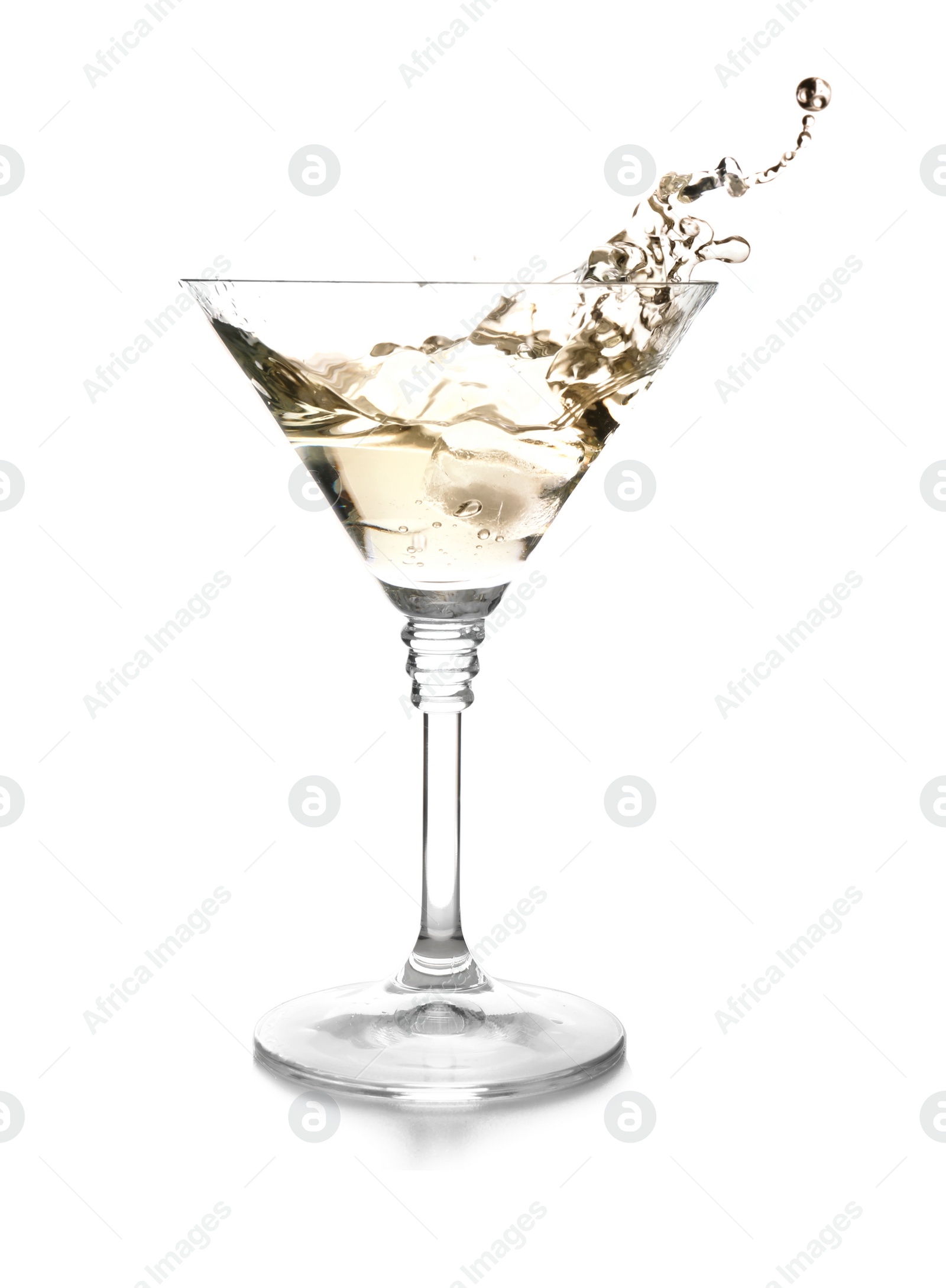 Photo of Glass of classic martini with splash on white background