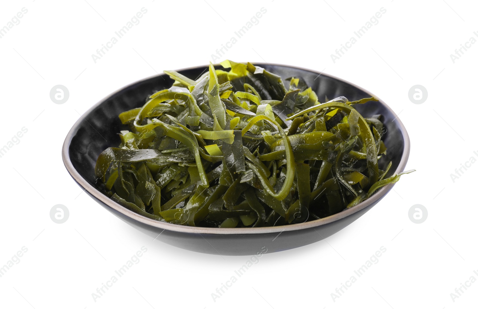Photo of Fresh laminaria (kelp) seaweed in bowl isolated on white