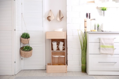 Modern eco style kitchen interior with wooden crates