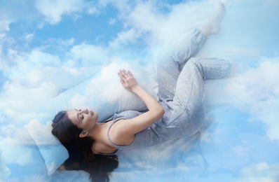 Double exposure of young woman sleeping in bed and blue sky