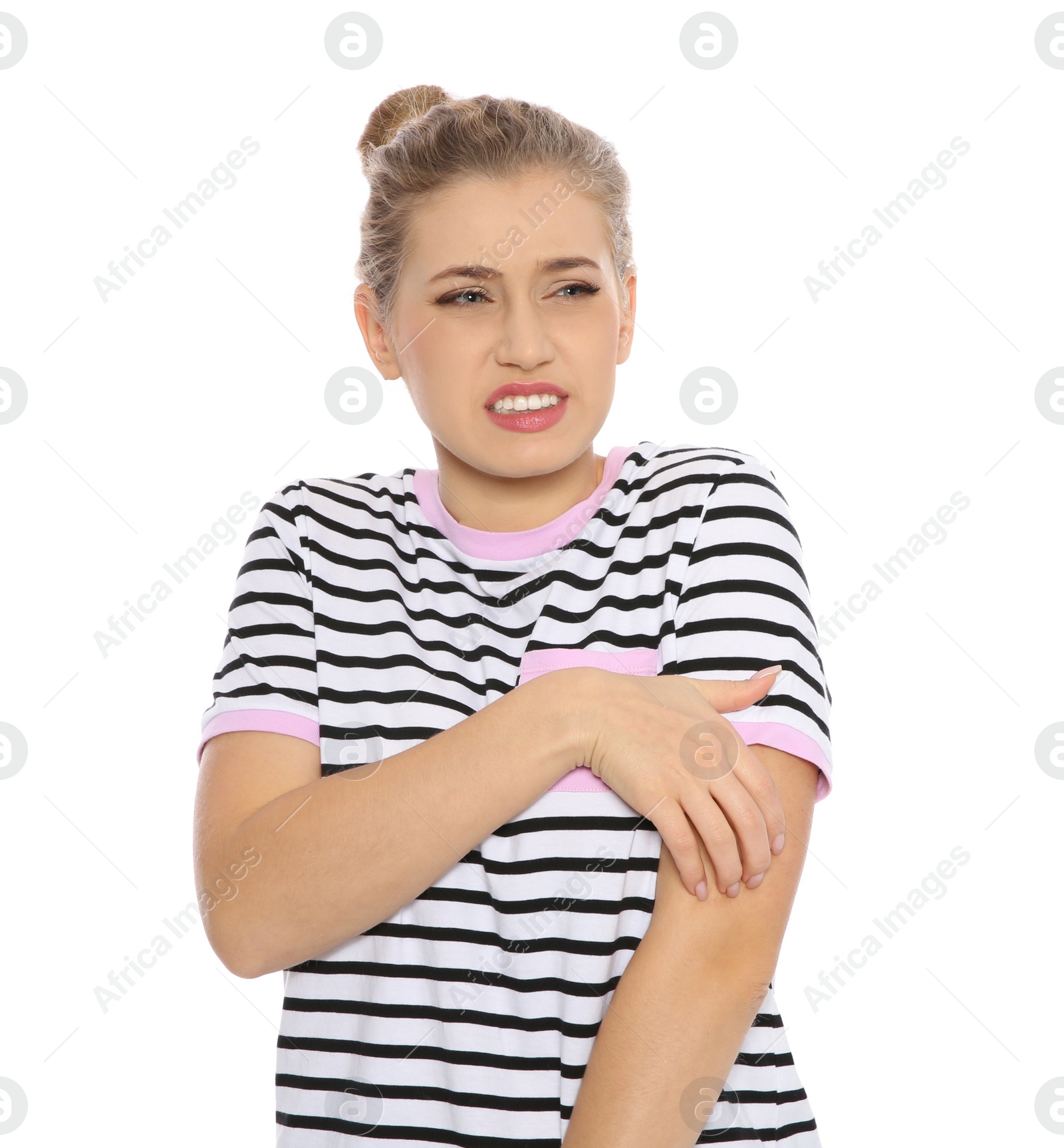 Photo of Young woman scratching skin on white background. Annoying itch